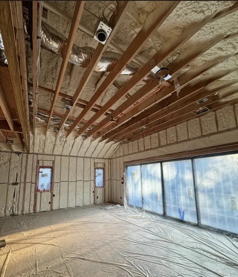 Interior walls and ceiling insulated with spray foam during new construction in Tobyhanna